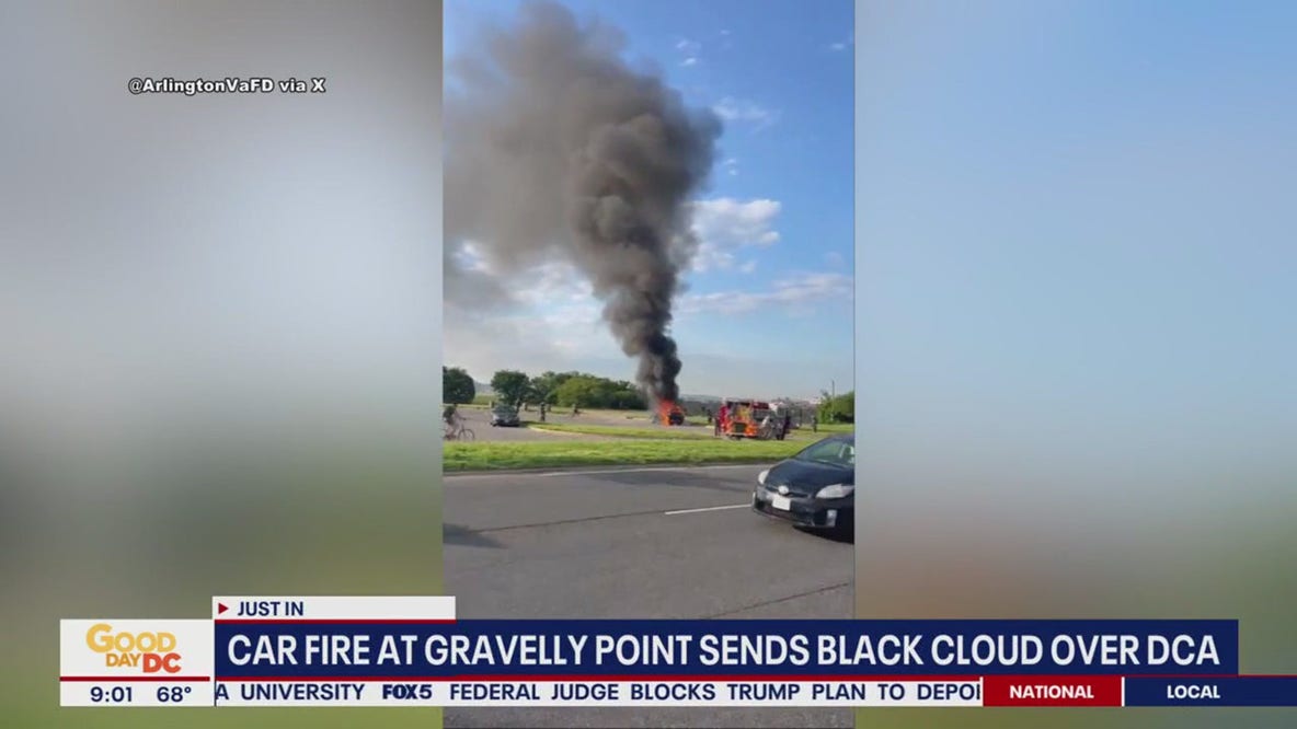 Plumbs of black smoke over Gravelly Point caused by vehicle fire